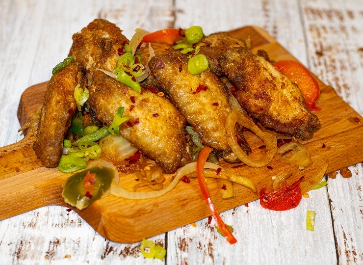 Experience the perfect blend of heat and crispiness with our signature chicken wings in Huddersfield.